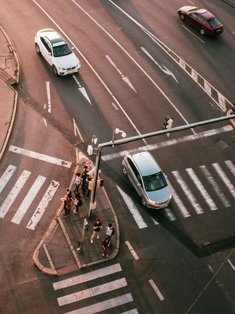 A pedestrian island in the middle of an intersection