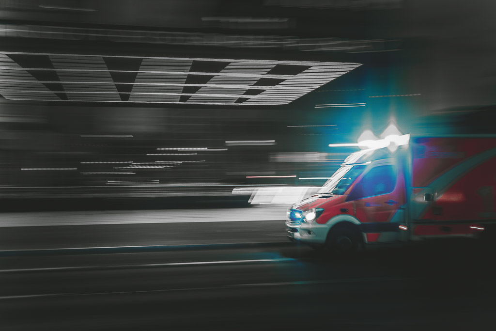 Emergency vehicle rushing through a tunnel